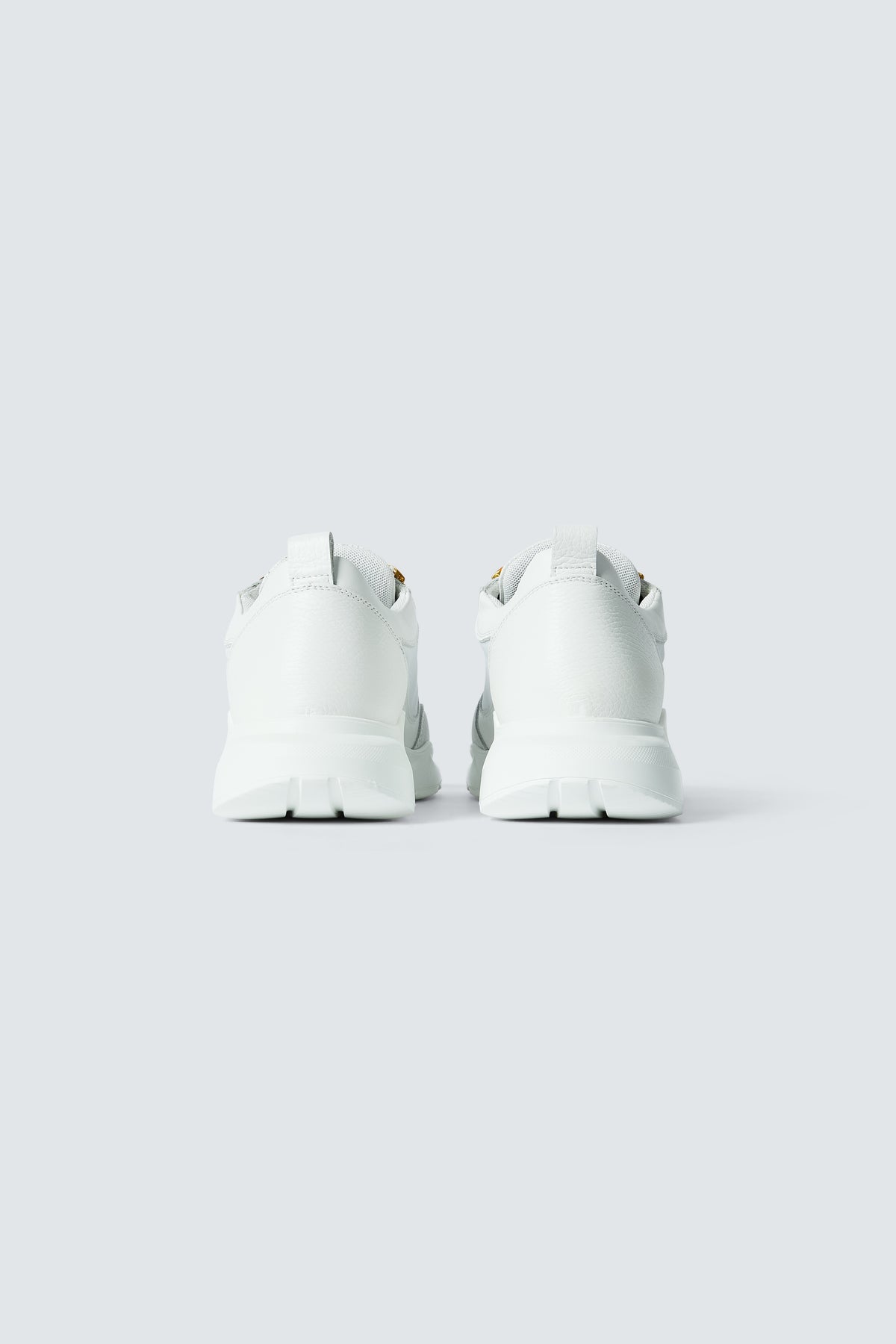 Stellar Scuba Sneakers in White by Maison Kargani
