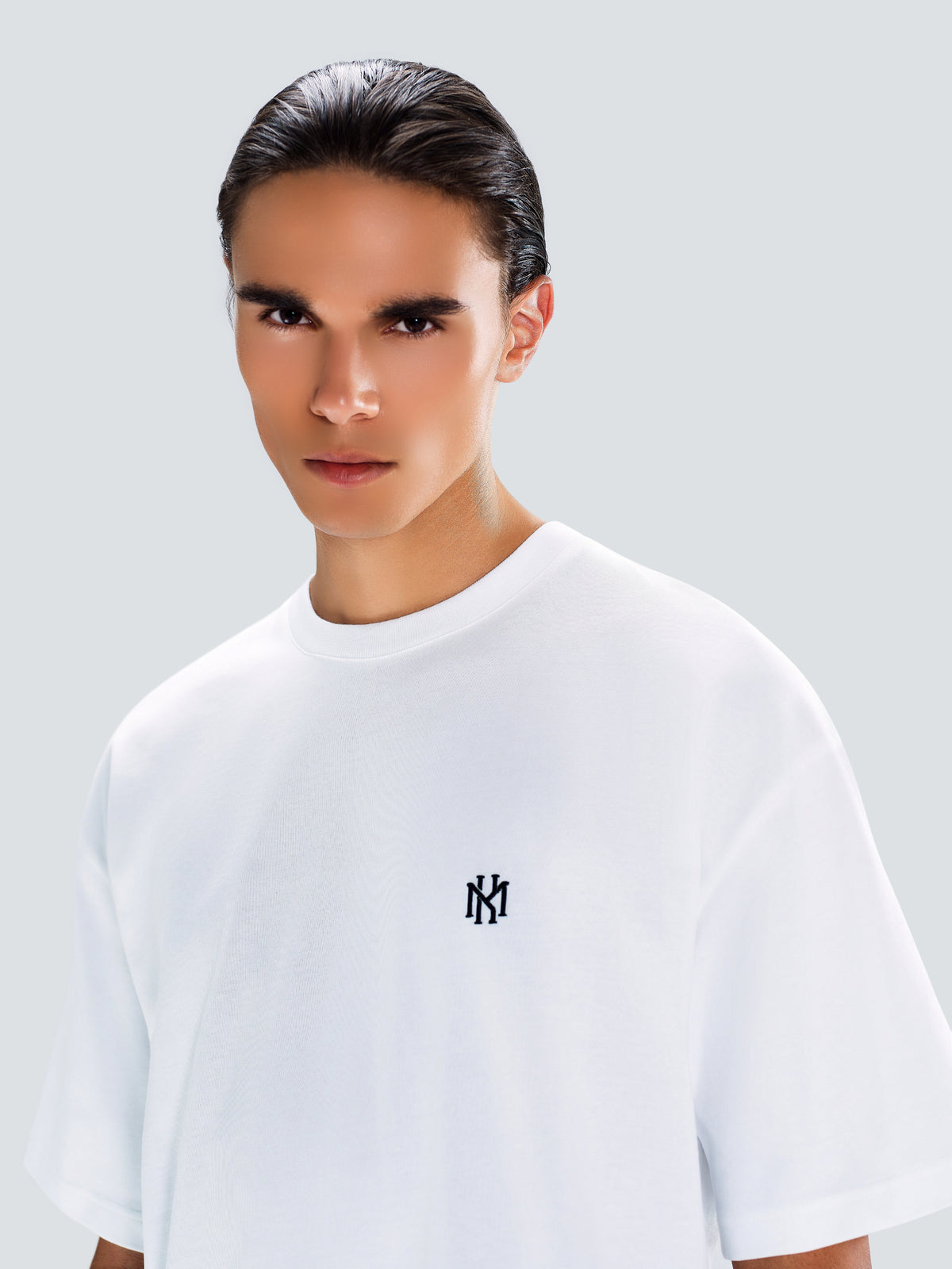 MK Monogram Oversized Cotton T-Shirt in White by Maison Kargani