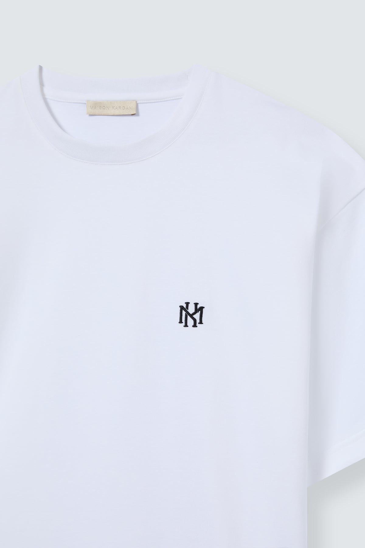 MK Monogram Oversized Cotton T-Shirt in White by Maison Kargani
